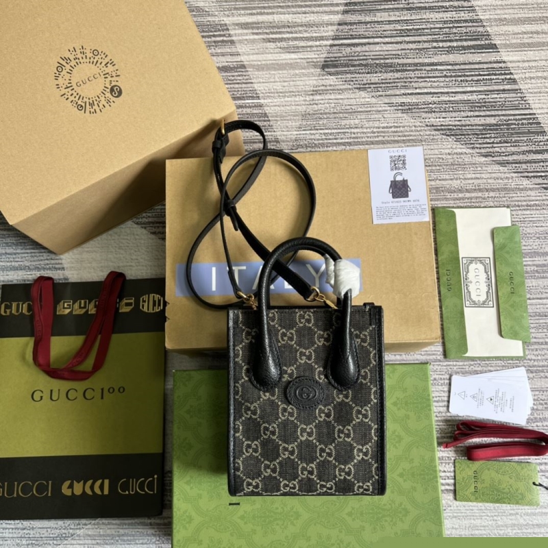 G*u*i top handle bags